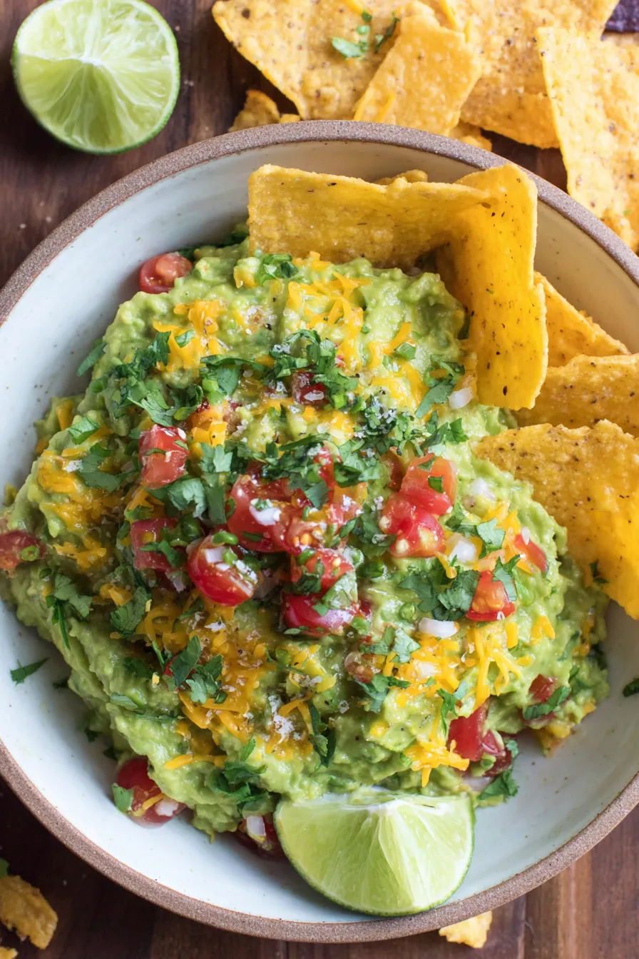 Cut avocados and grated cheddar ready for mixing