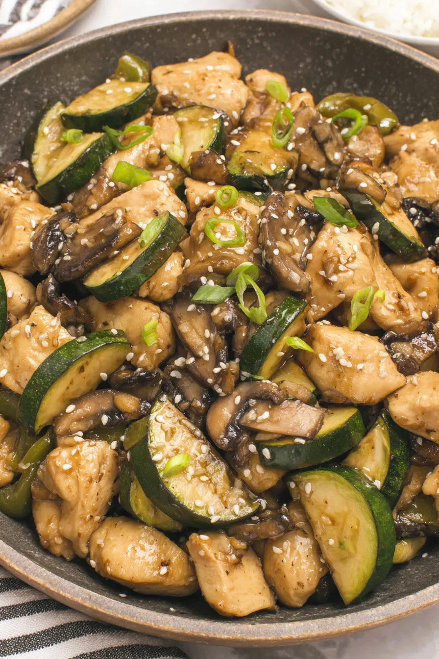 Cooked Panda Express style mushroom chicken in skillet