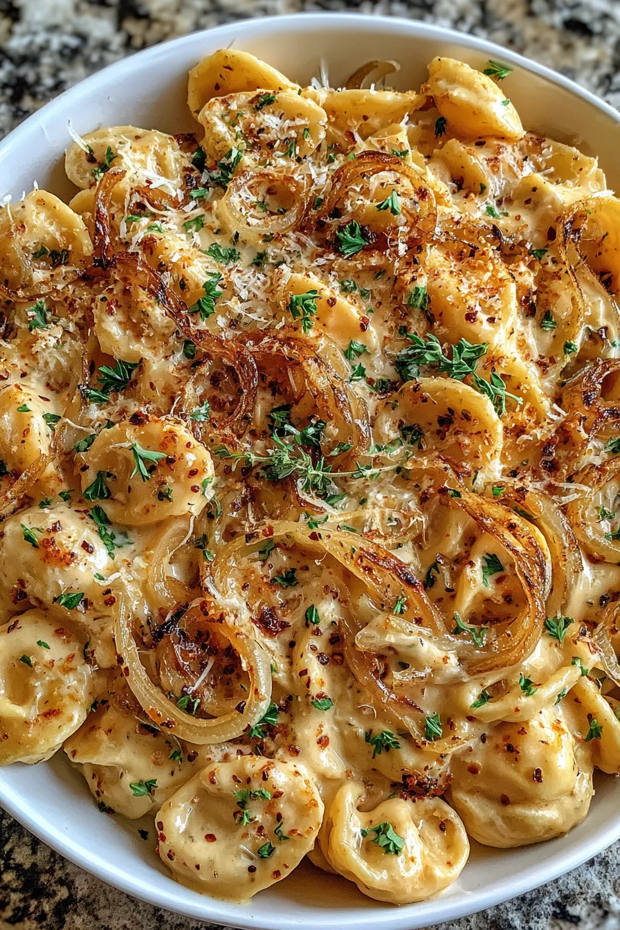 Creamy pasta with melted Gruyère and chopped parsley