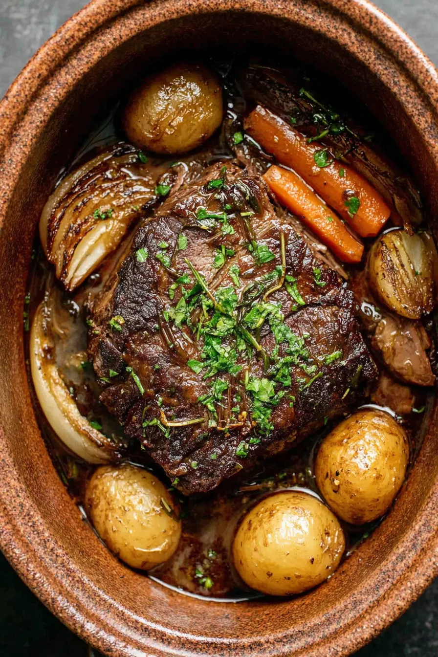 Close up of pot roast with carrots and potatoes