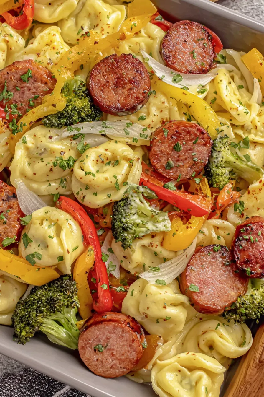 Close up golden pierogy and browned kielbasa