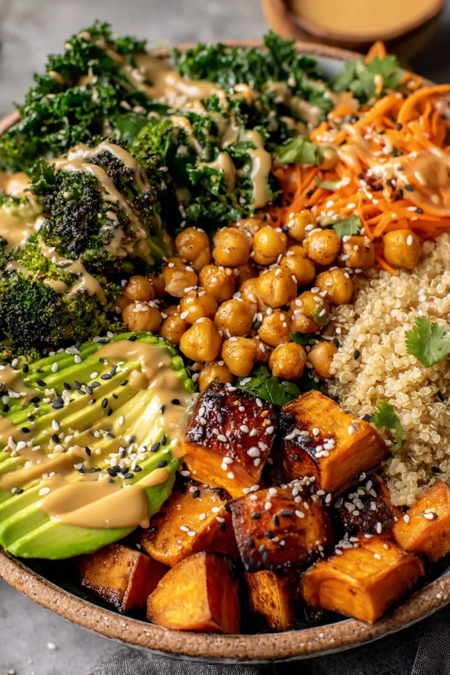 Assembled miso sweet potato bowls with avocado and sesame seeds