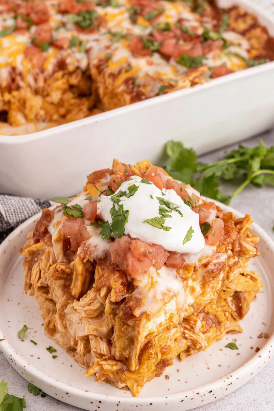 Close-up of layered chicken, beans and melted cheese