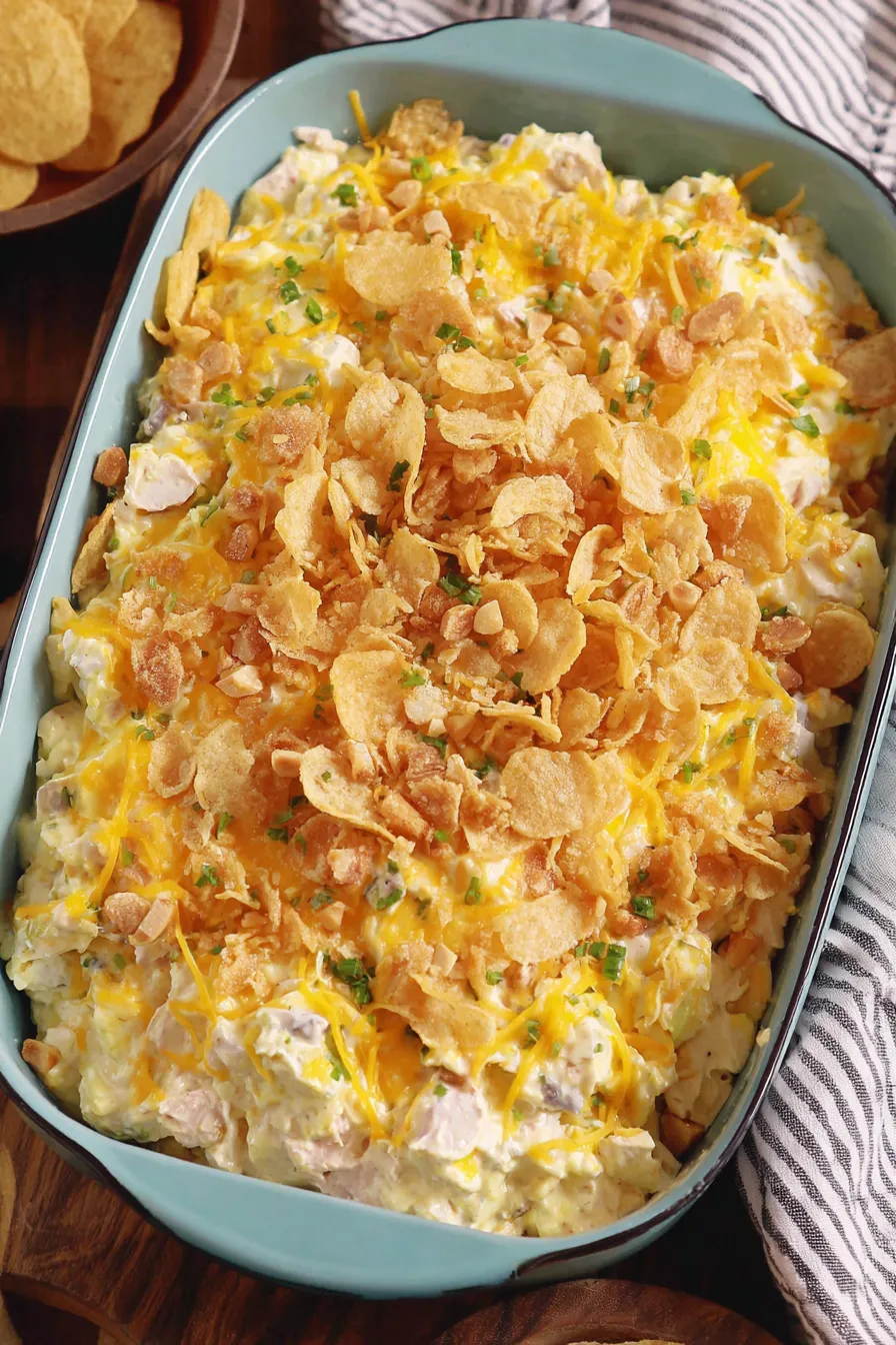 Served chicken salad casserole with fresh garnish