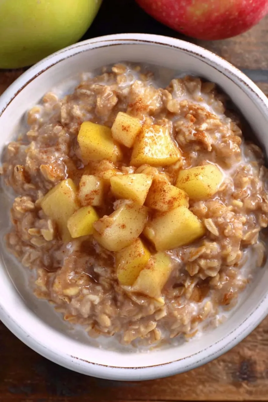 Served bowls of apple cinnamon oatmeal with toppings