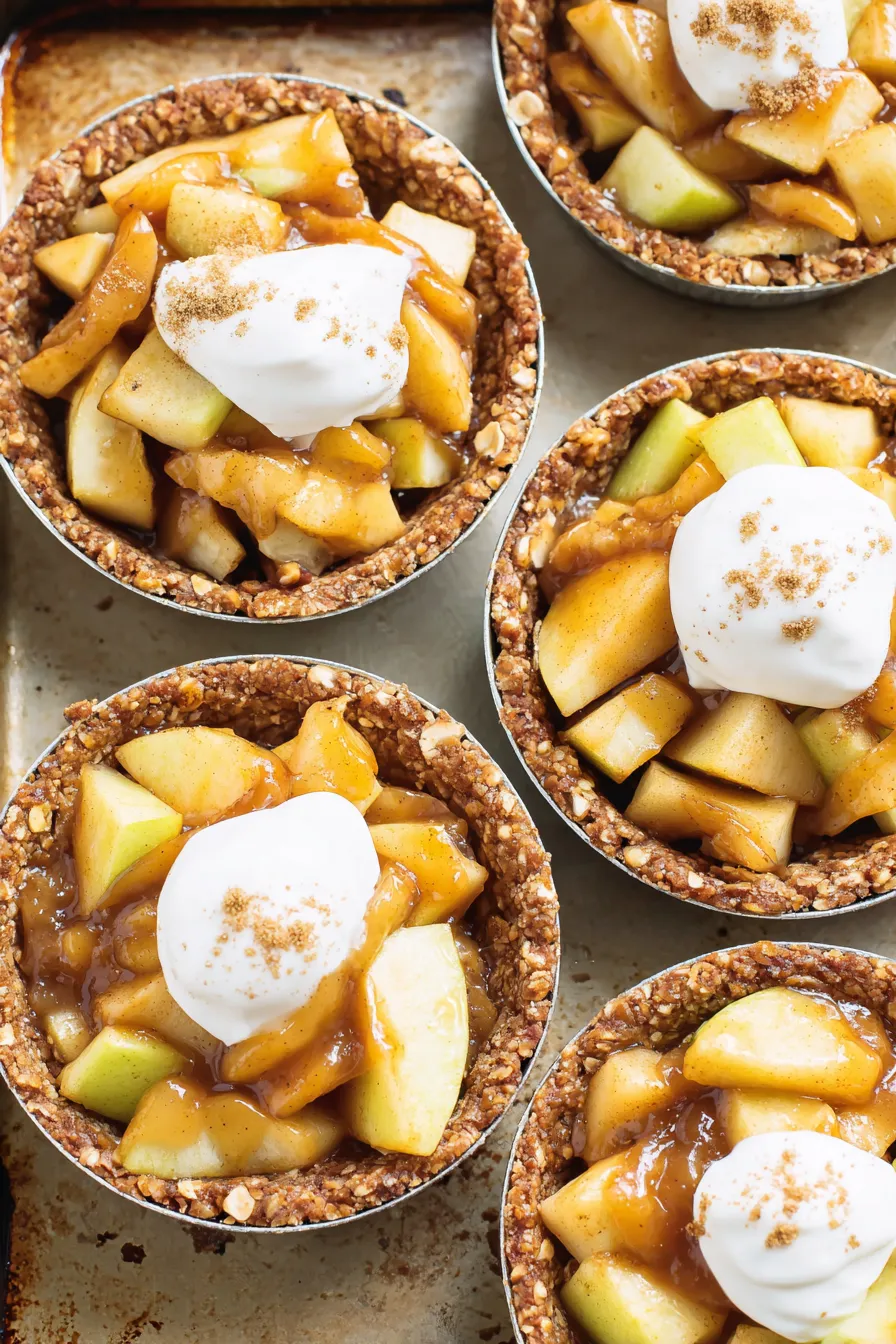 Finished caramel apple tartlets on a serving tray