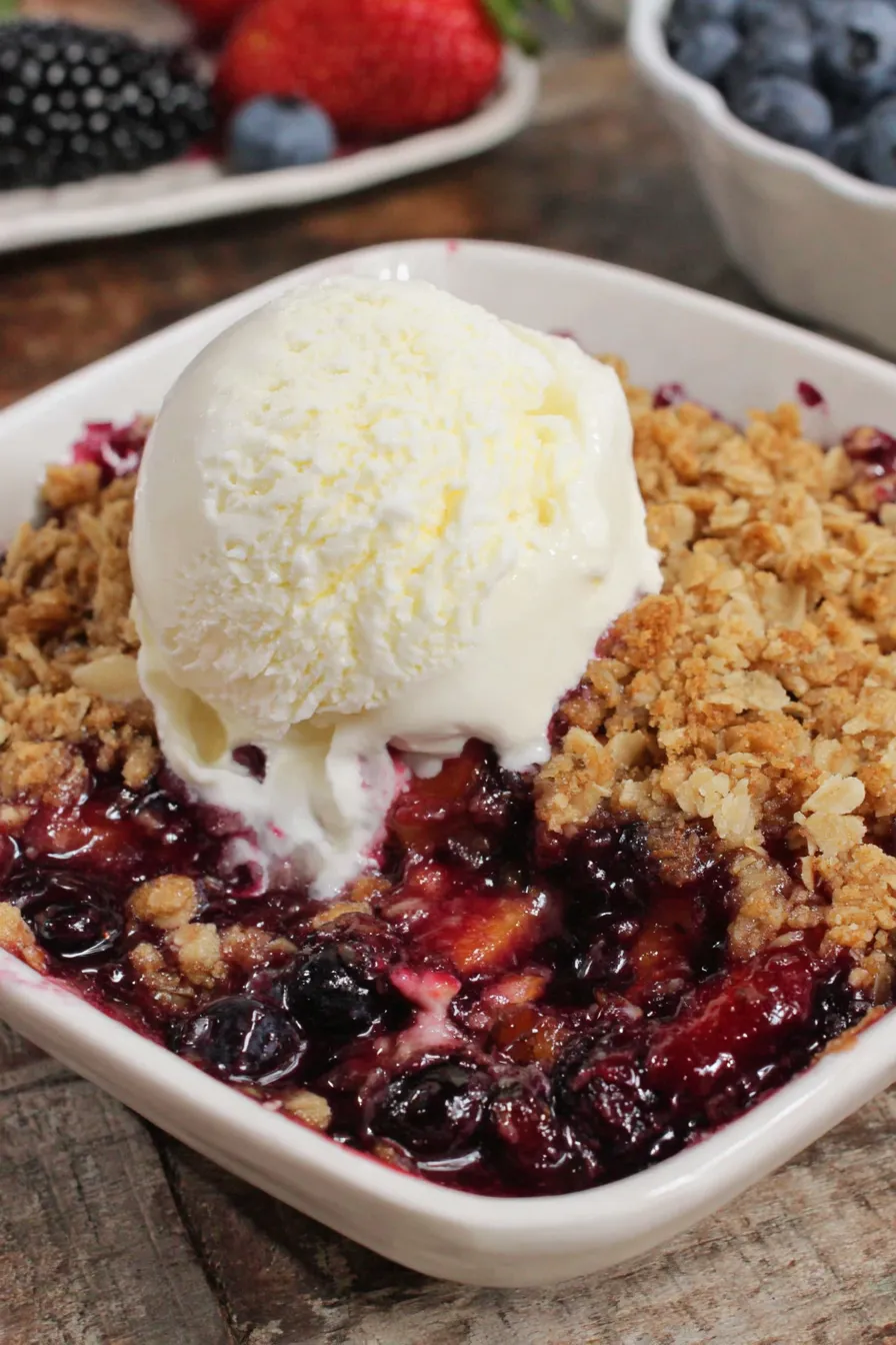 Close up of crisp topping and fruit filling