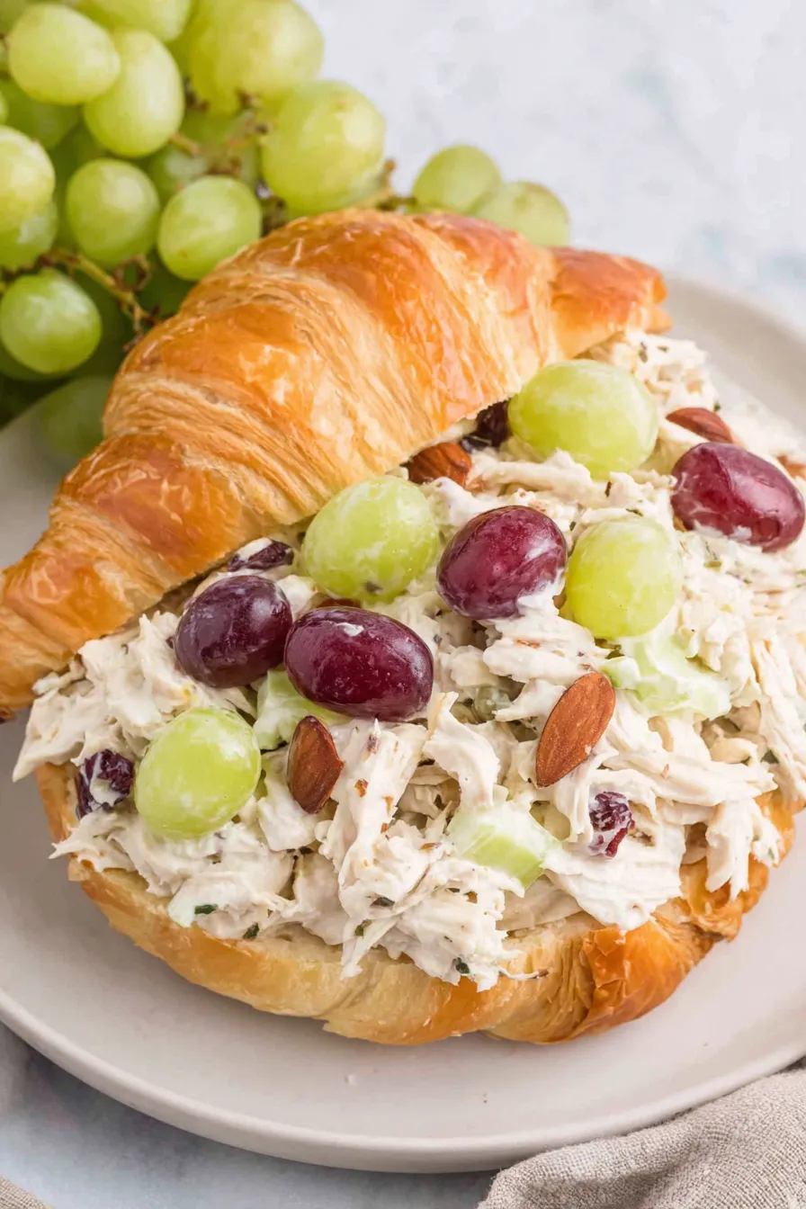 Prepared chicken salad served on croissant