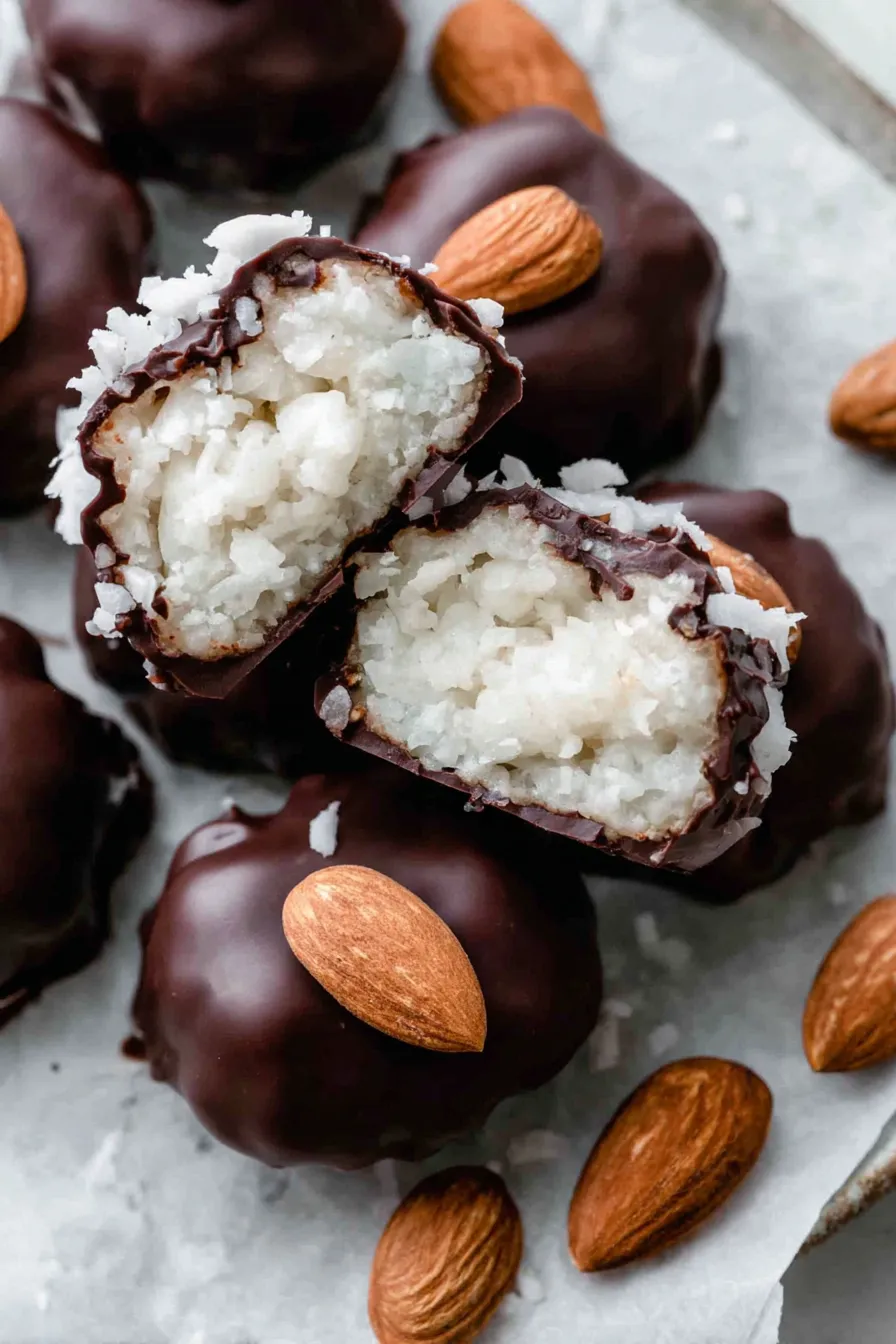 Dipping coconut centers into melted chocolate