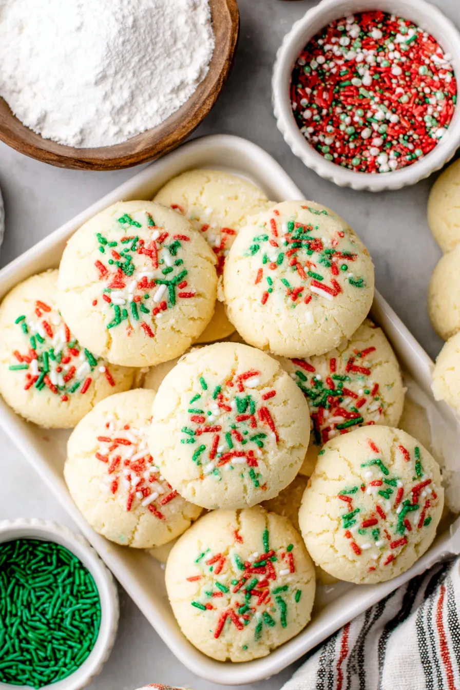 Shortbread dough on baking sheet with sprinkles
