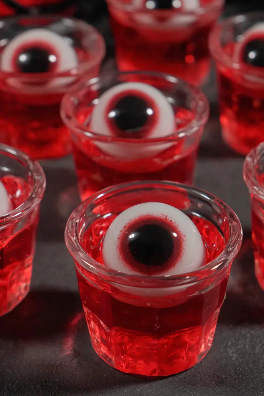 Row of Halloween eyeball jello shots setting in the fridge