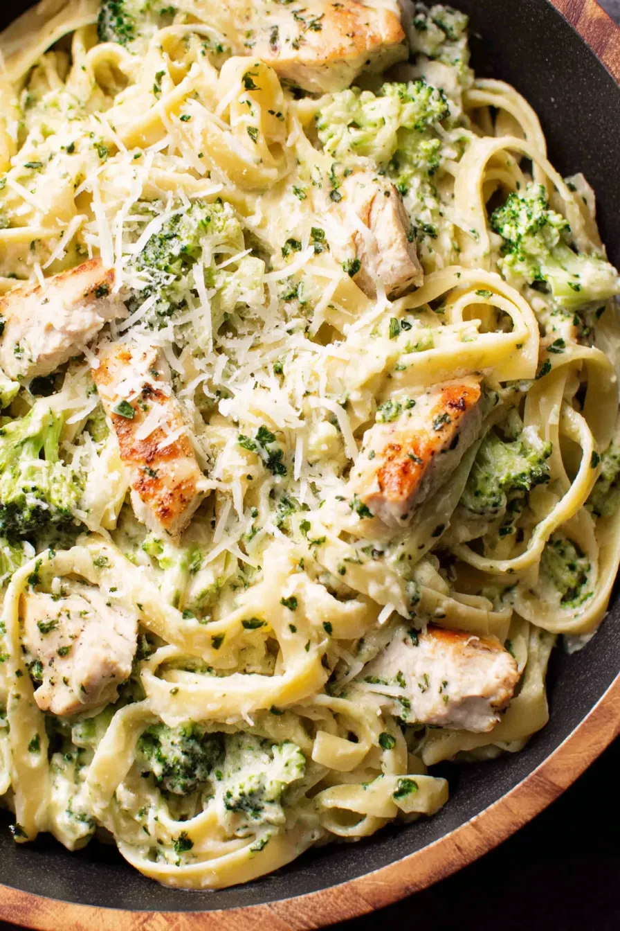 Plated Fettuccine Alfredo with chicken and broccoli