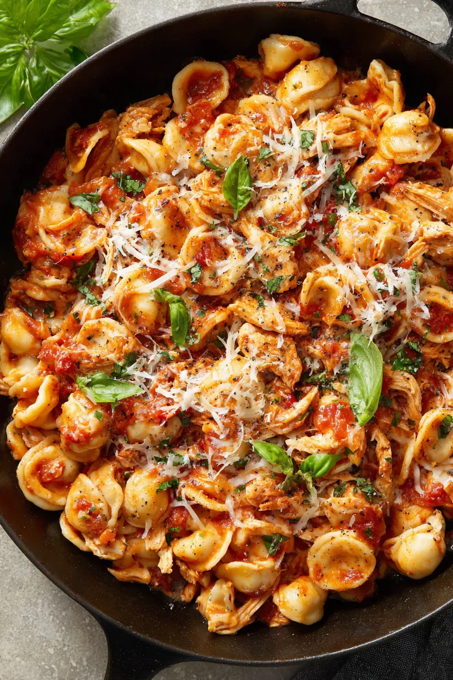 pot of chicken fra diavolo sauce simmering