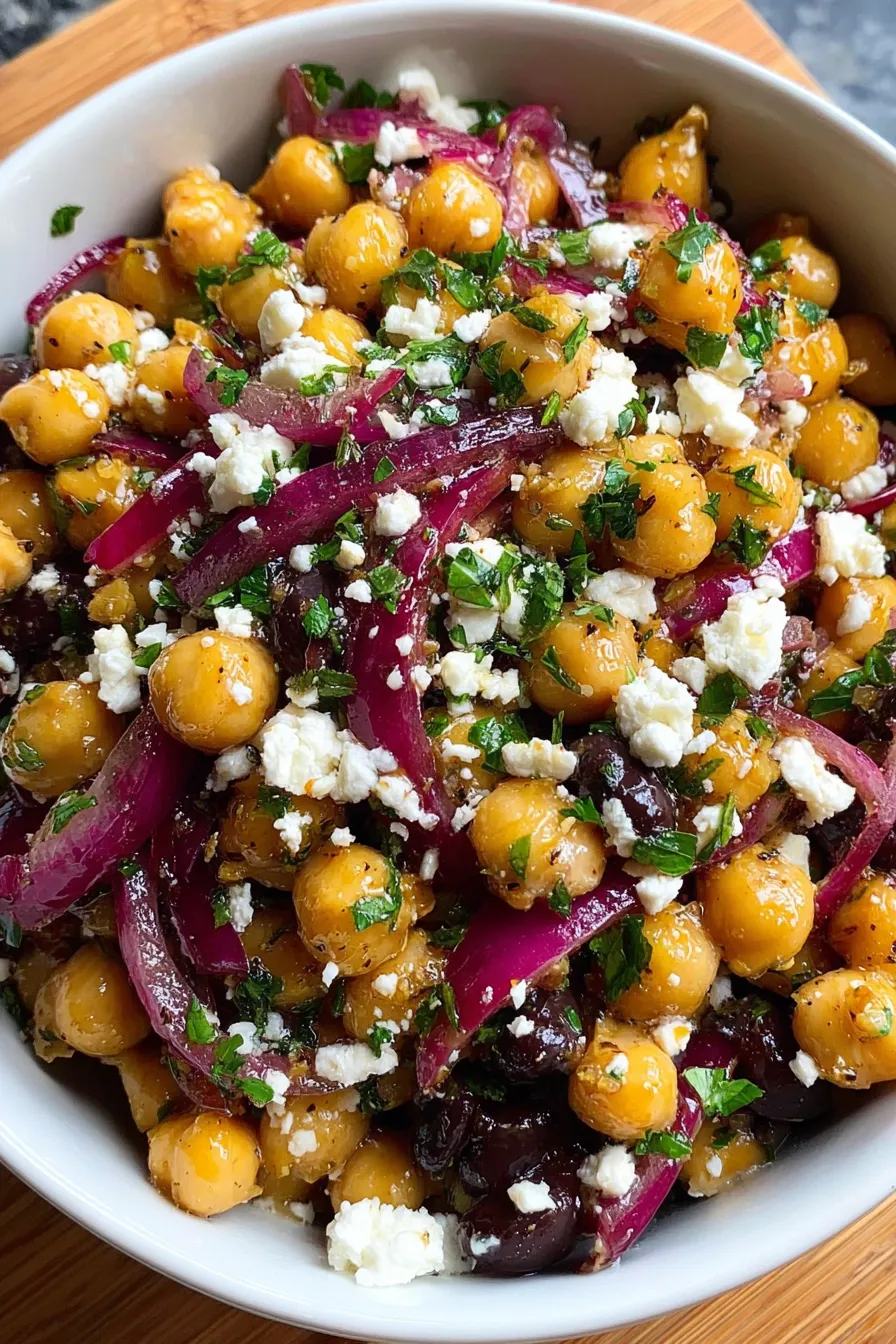 Chickpeas and black beans tossed with herbs and feta