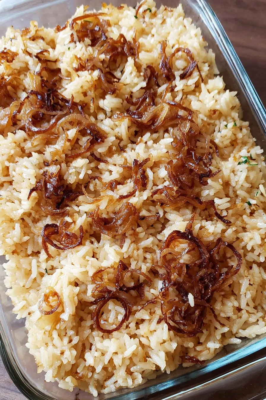 Portion of French Onion Soup Rice Bake plated with garnish