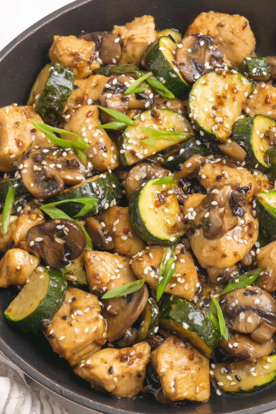 Sizzling mushroom and chicken in a wok