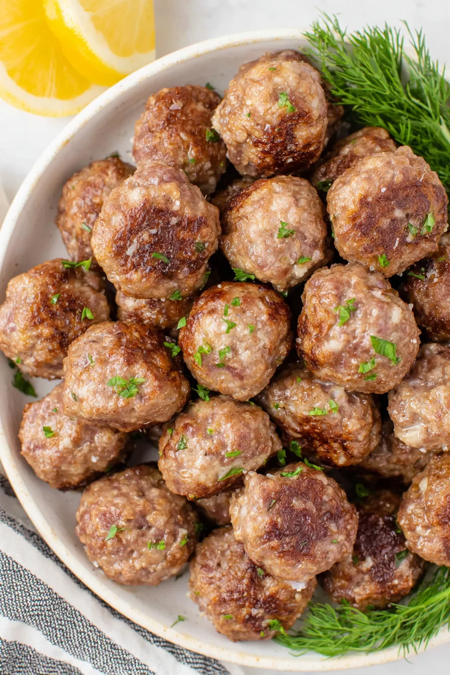 meatballs served with pasta and garnish