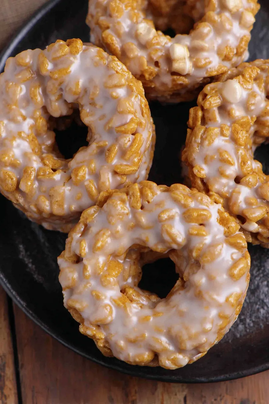 Pumpkin Rice Krispies donuts cooling in pan