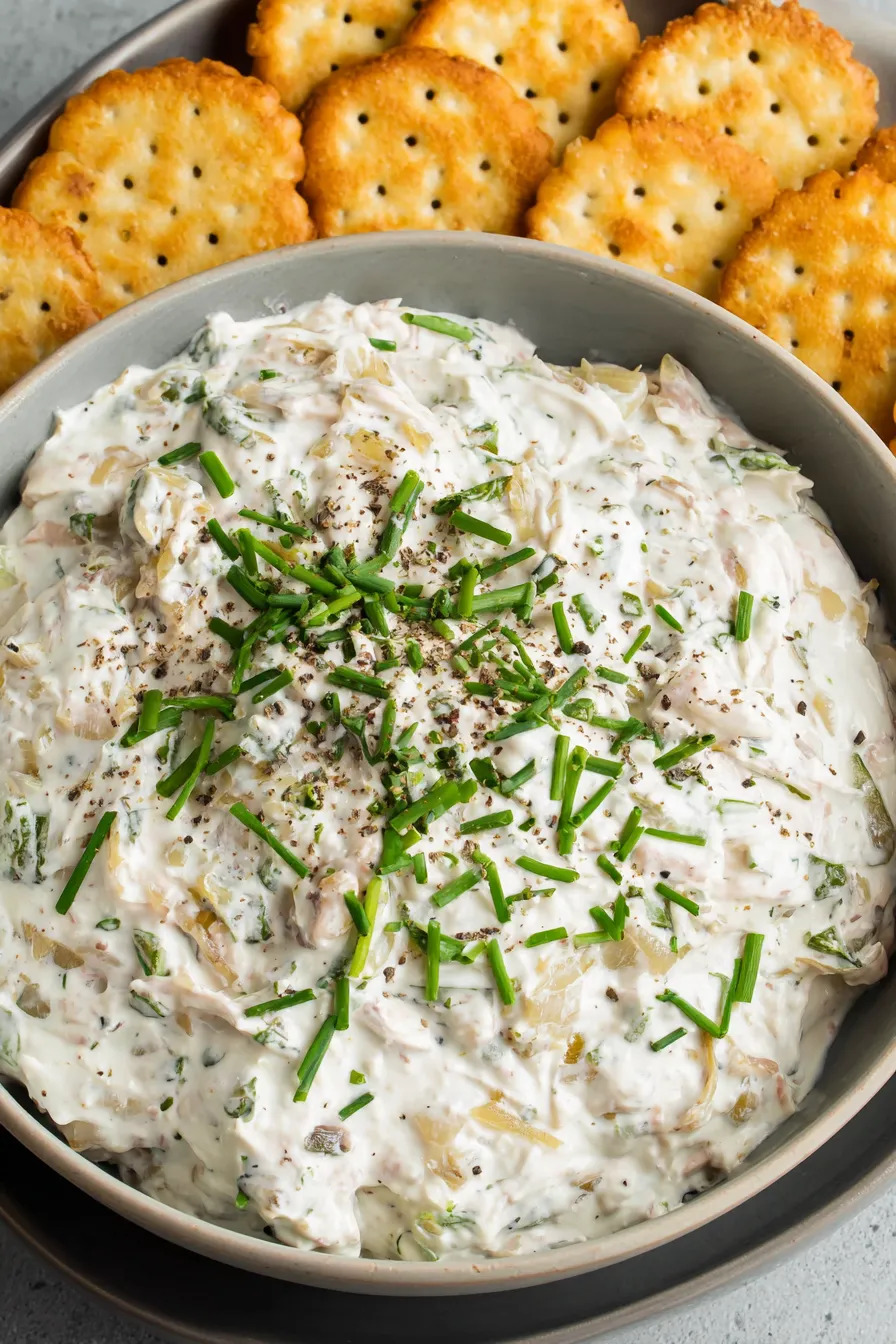 Caramelized onions and creamy dip in a bowl