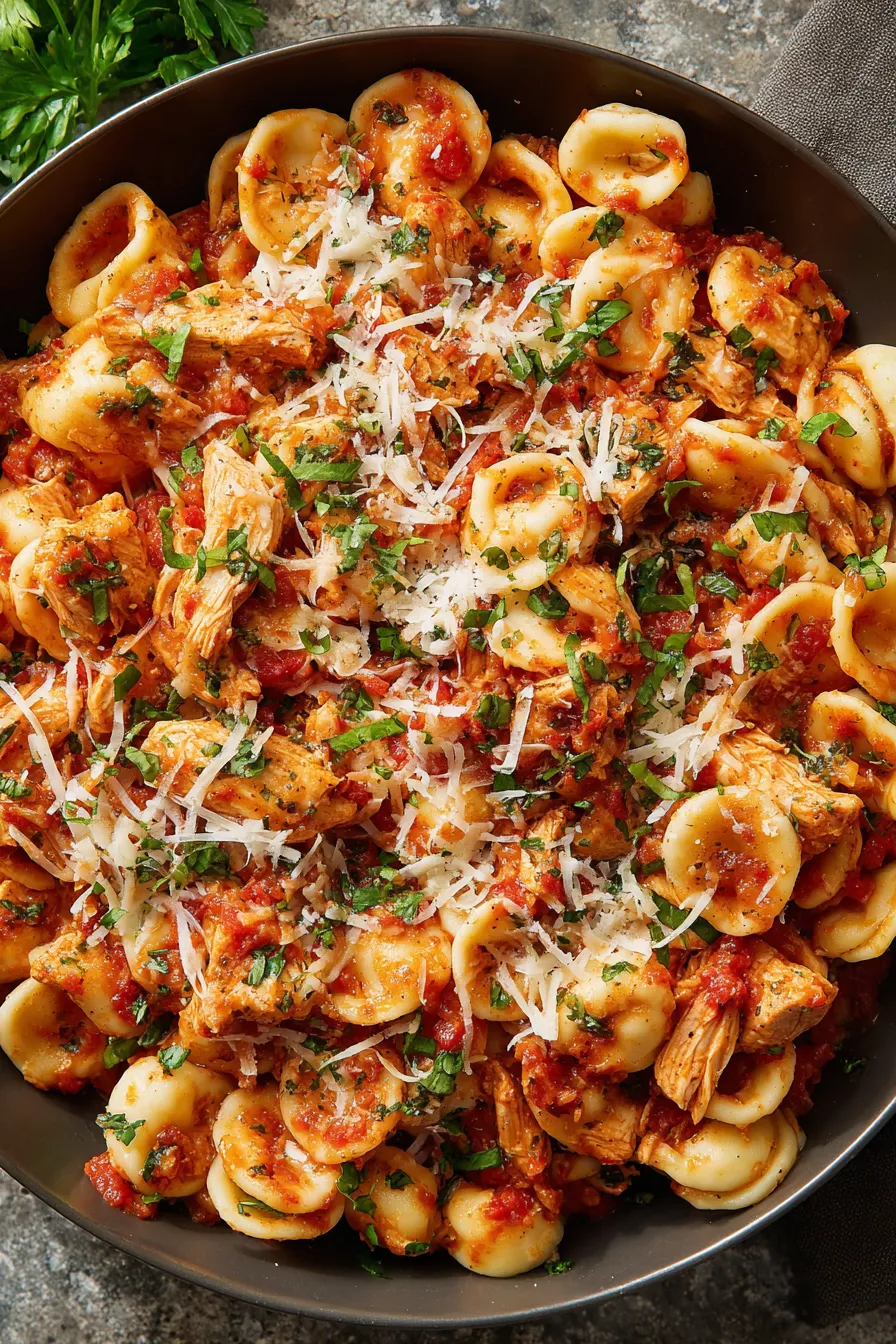 Finished Chicken Fra Diavolo Pasta in a bowl with basil