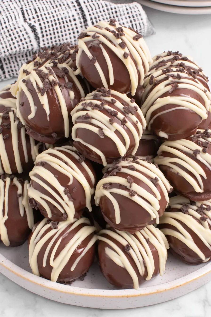 Kahlua balls being dipped in chocolate