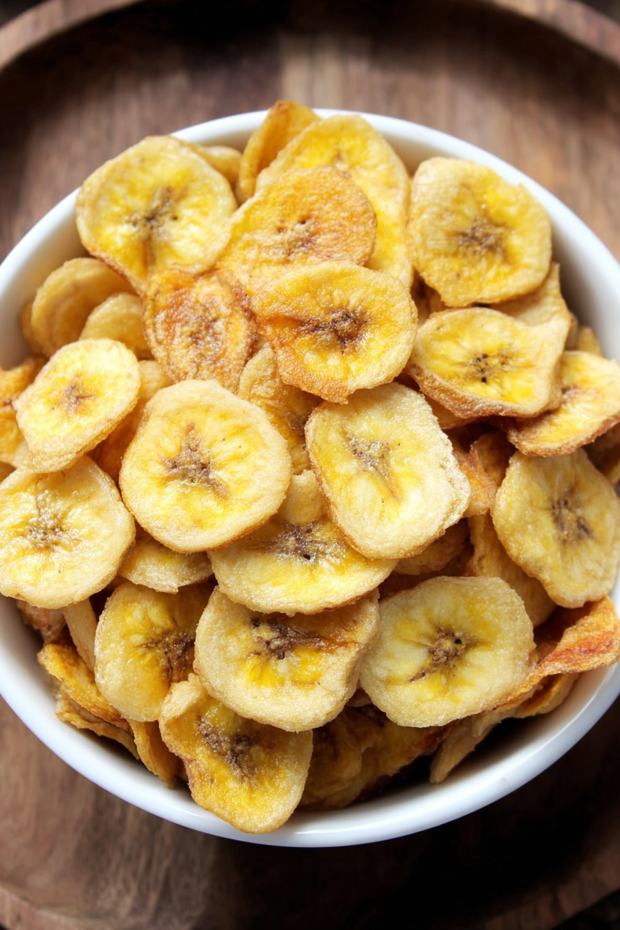 Finished crispy banana chips in a bowl